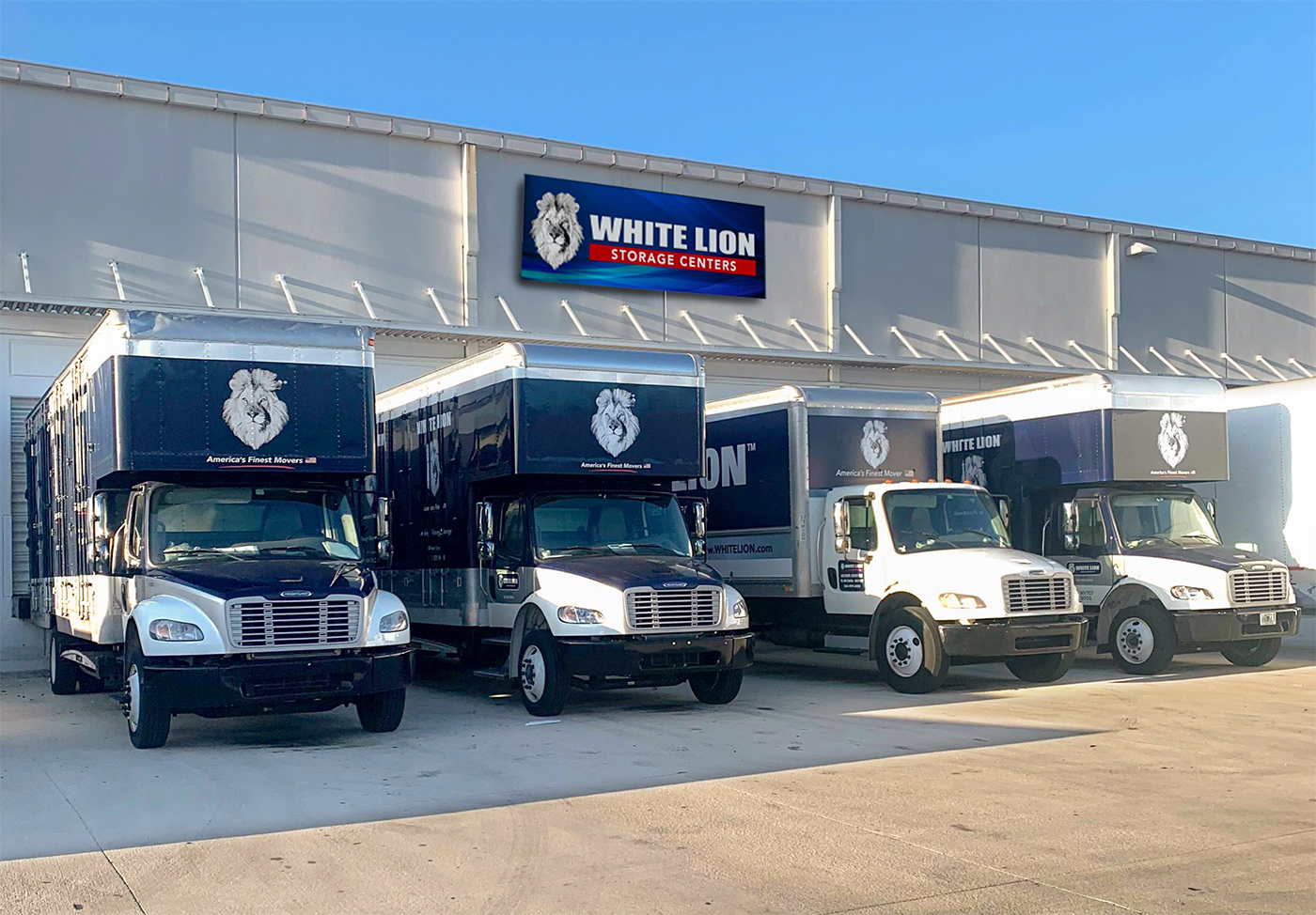 white lion's fleet of trucks