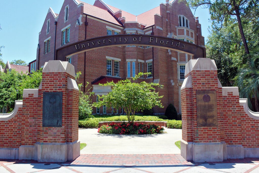 Gates to the University of Florida's building covered in red brick